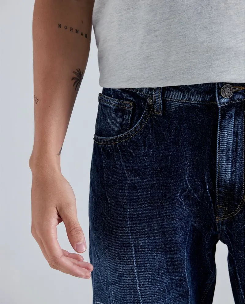 Jean Tapered fit tono medio para hombre