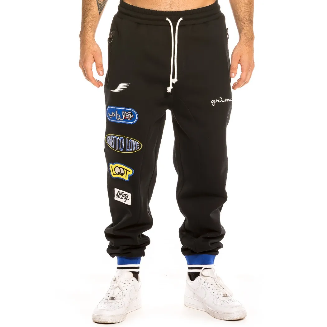 Pantalón deportivo GRIMEY cómodo UNISEX Arch Rival Sweatpants Negro Ref. GRTS188-FW20-BLK negro parches bordados