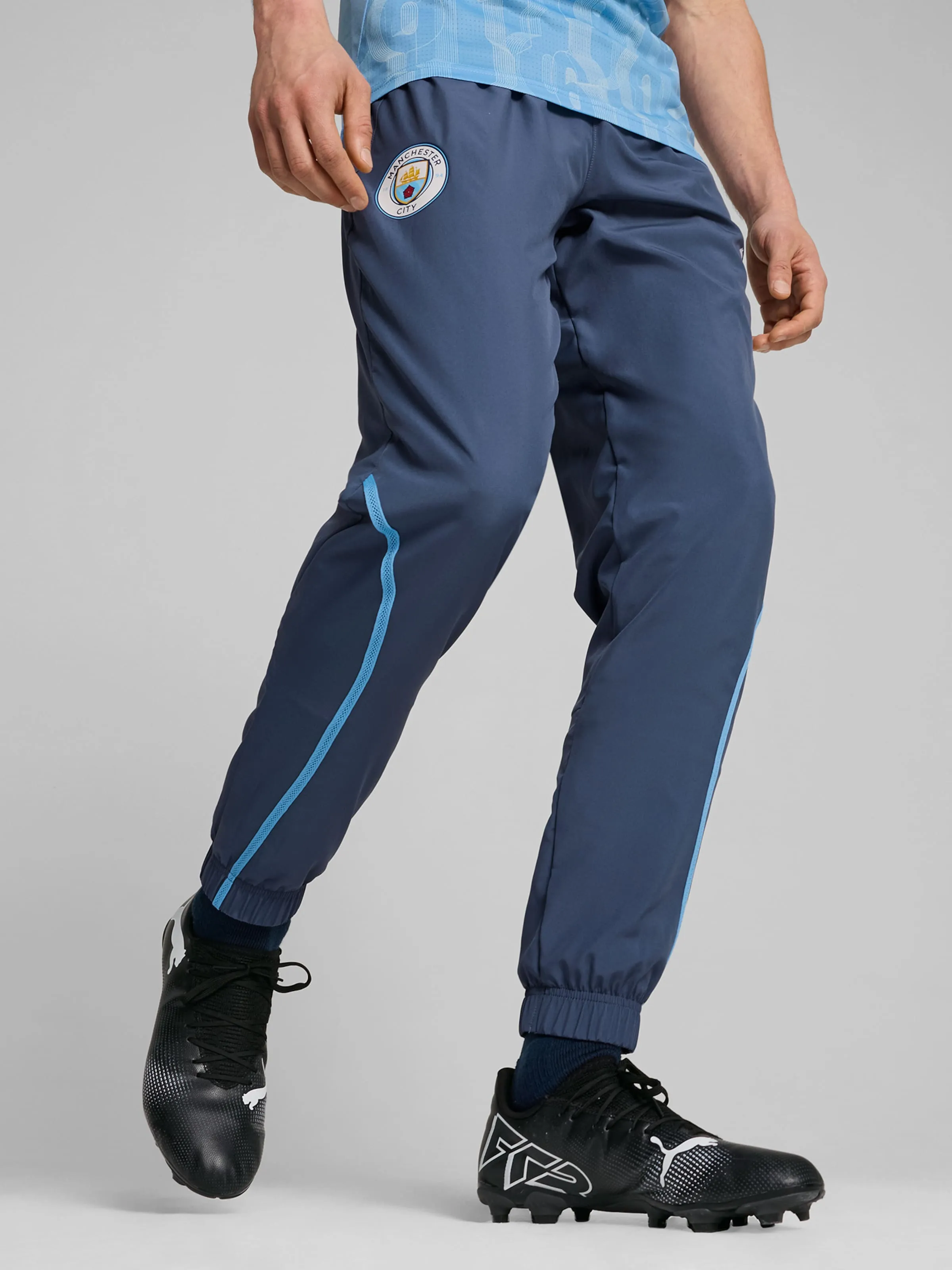 Tapered Pantalón deportivo 'MCFC Prematch' PUMA en Zafiro, Azul Cielo