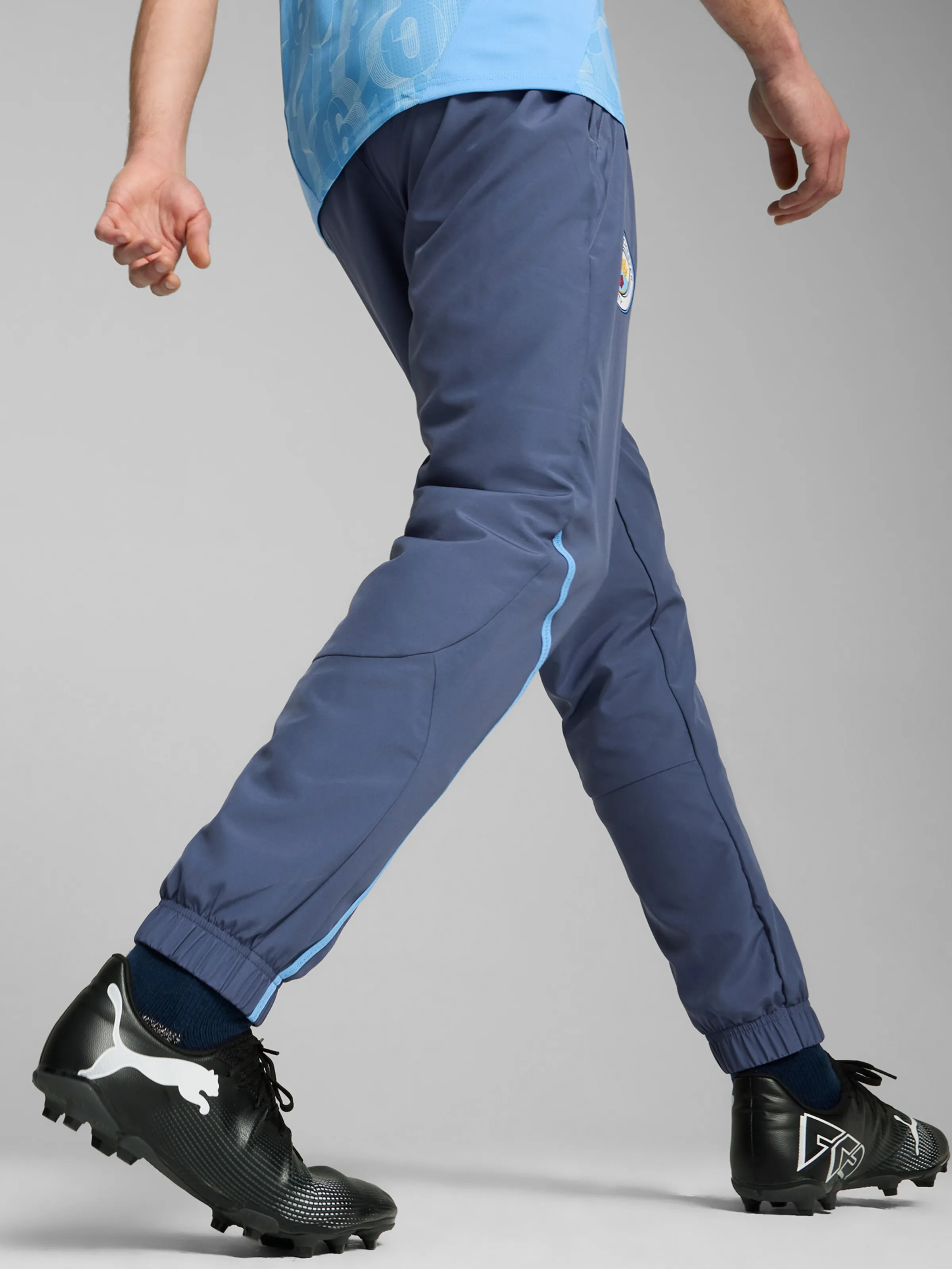 Tapered Pantalón deportivo 'MCFC Prematch' PUMA en Zafiro, Azul Cielo